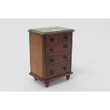 Victorian miniature mahogany chest of drawers, two short and three long,