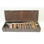 Old xylophone in wooden case