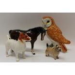 Beswick model of an owl, model no. 1046, Beswick horse and two Beswick dogs (4) CONDITION REPORT All