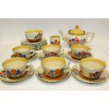 Clarice Cliff Bizarre range Crocus pattern hand-painted teaware (24 pieces) CONDITION REPORT