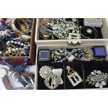 Quantity of vintage costume jewellery, brooches, necklaces,