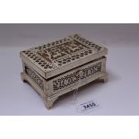 Early 19th century Russian Kholmogory Walrus ivory casket with pierced decoration,