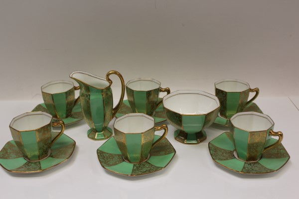 Art Deco Royal Doulton green and gilt part coffee set (14 pieces) CONDITION REPORT Sugar bowl has