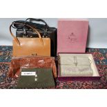 Selection of vintage handbags including boxed Asprey silver evening bags,