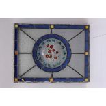 Stained glass window with blue border,