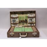 1950s six place picnic set including Brexton storage containers and tableware, two Thermos flasks,