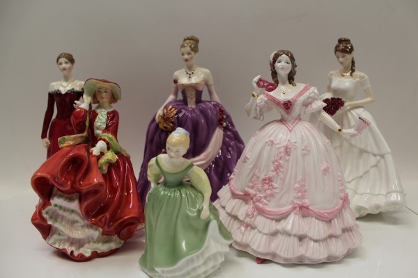 Four Royal Worcester figures - Roses of Love, The Masquerade Begins, Lucy and Winter Parade and