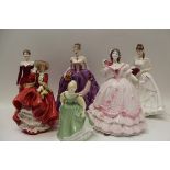 Four Royal Worcester figures - Roses of Love, The Masquerade Begins, Lucy and Winter Parade and