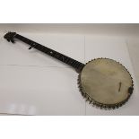 Vintage banjo with mother of pearl star decoration to neck, in case CONDITION REPORT There are no