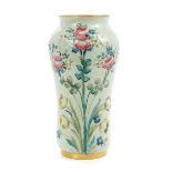 Macintyre William Moorcroft Florian ware vase with gilt rim and floral decoration on pale green