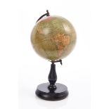 Early 20th century Philips six inch terrestrial globe, on a turned ebonised wood stand,