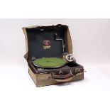 The Grippa Table-Top Gramophone, in leather case with canvas outer cover CONDITION REPORT Very