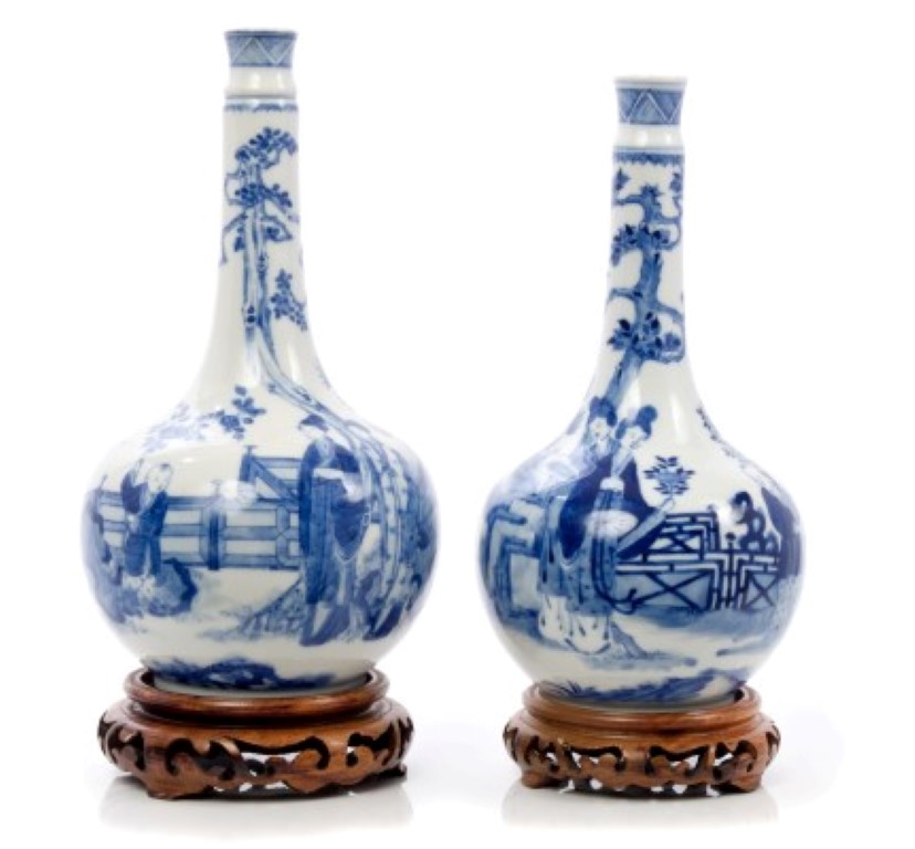 Pair of late 19th / early 20th century Chinese blue and white bottle vases with waisted necks,