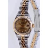 Ladies' Rolex Oyster Perpetual Date Just wristwatch, model no. 69173, with gold satin finish dial