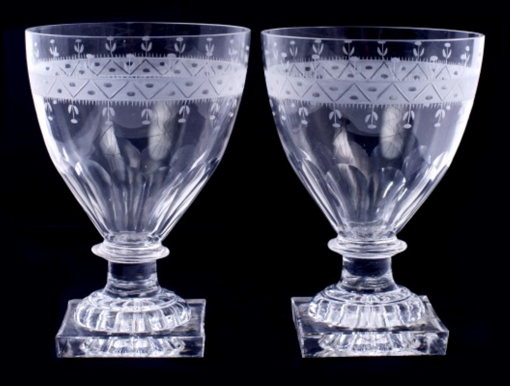 Pair of Georgian glass rummers with etched bands and facet cut decoration, knopped stem on moulded