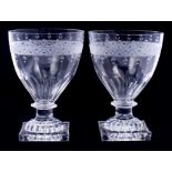 Pair of Georgian glass rummers with etched bands and facet cut decoration, knopped stem on moulded