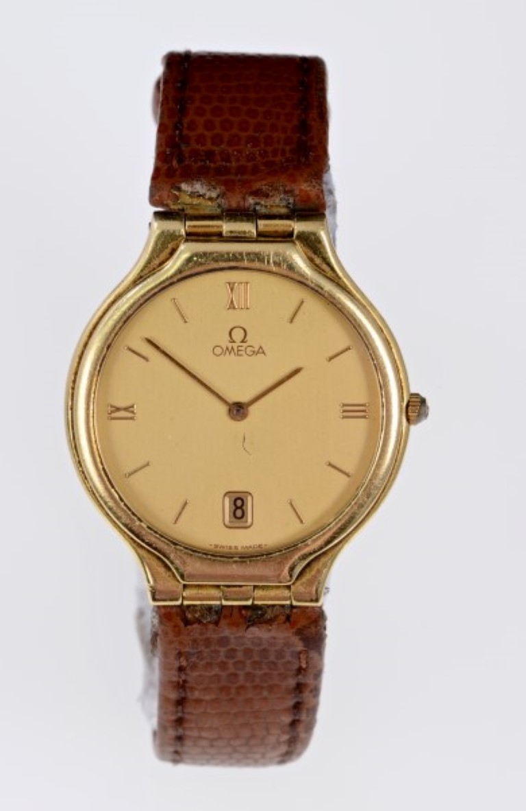 Gentlemen's Omega gold (18ct) wristwatch with quartz movement, gold coloured dial with date