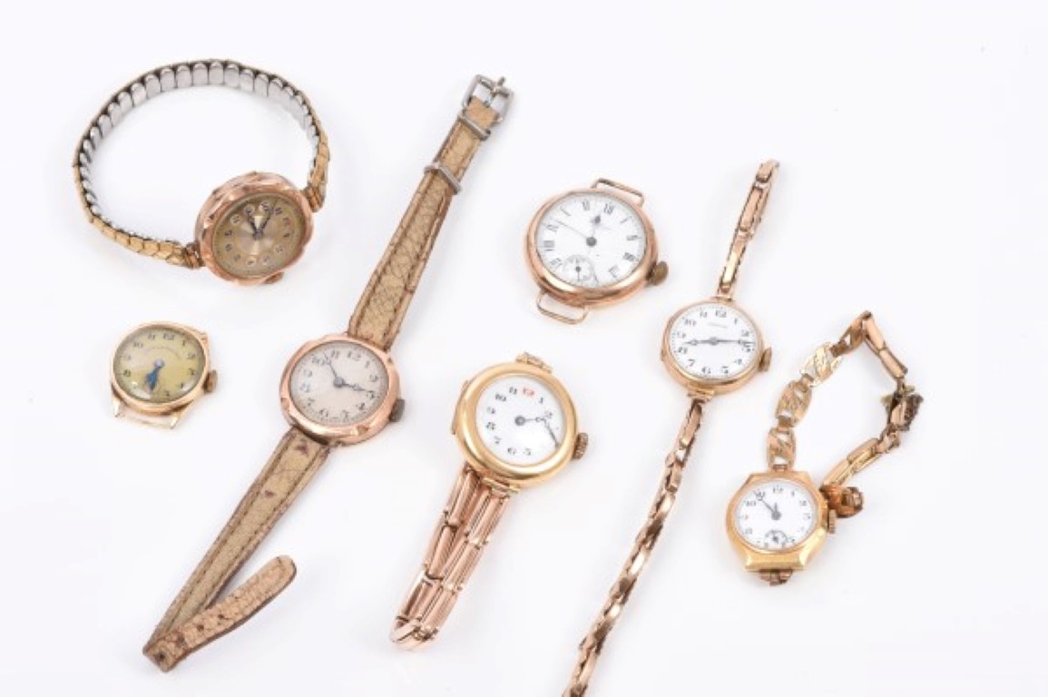 Seven early 20th century ladies' gold cased wristwatches - various