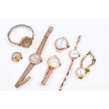 Seven early 20th century ladies' gold cased wristwatches - various