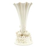 Late 19th century Belleek porcelain vase of reeded trumpet form with applied fine flower and leaf