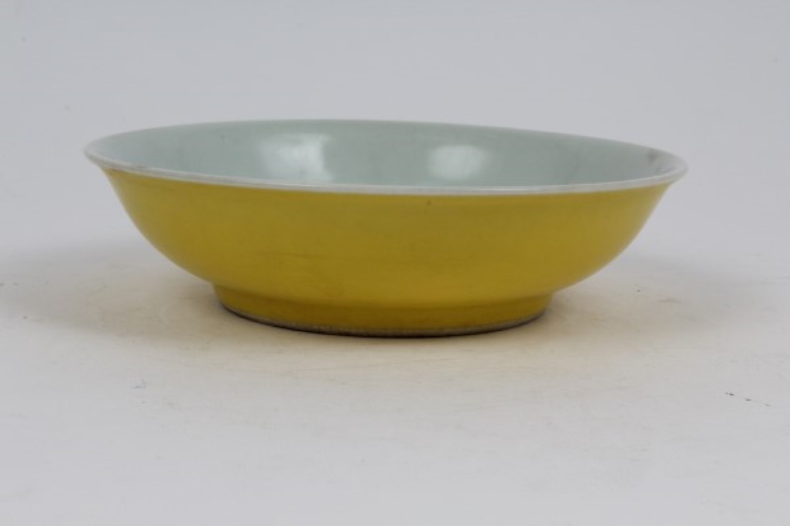 Chinese Imperial yellow glazed saucer dish with underglazed blue six character mark, 16cm
