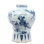 18th century Delft tin glaze blue and white pottery vase of octagonal baluster form with Chinese