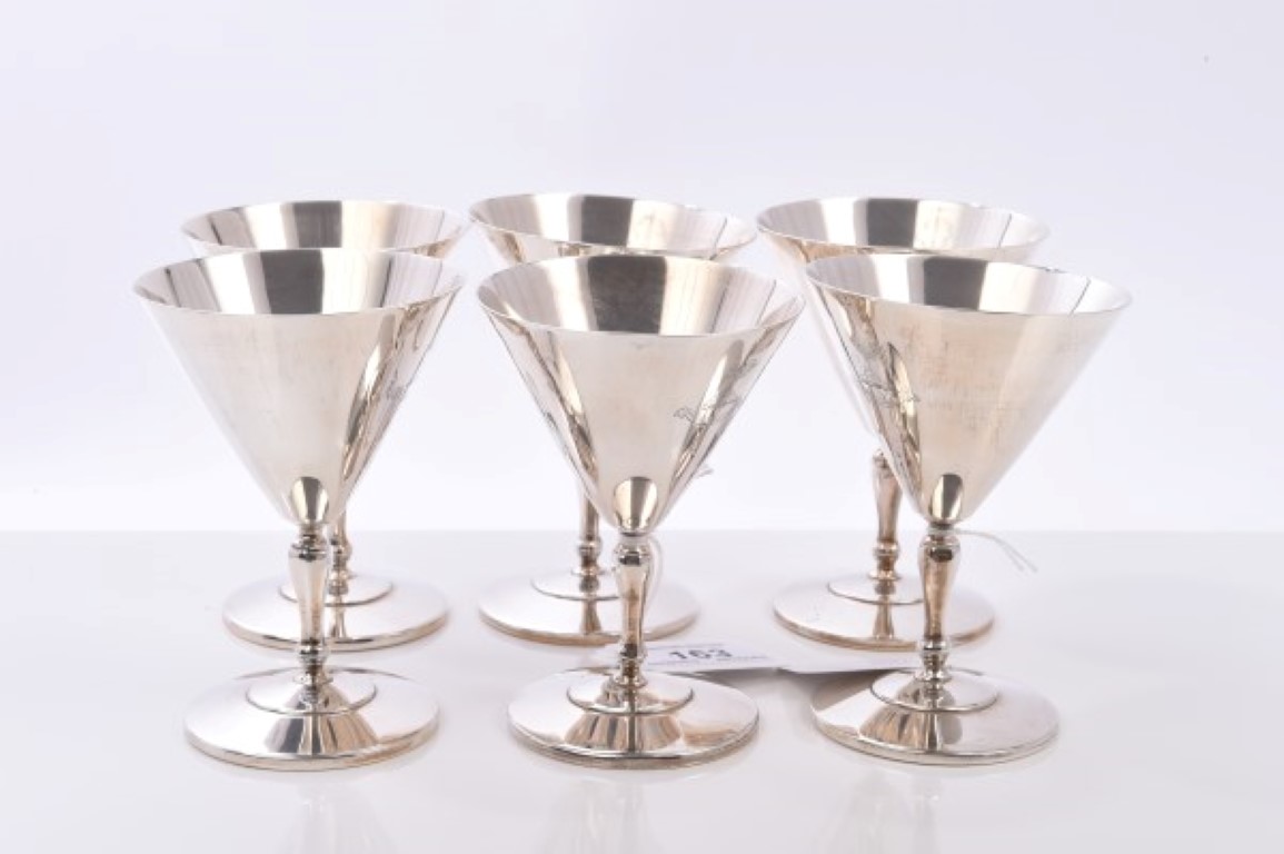 Set of six contemporary silver goblets of conical form, with slim hexagonal stems,