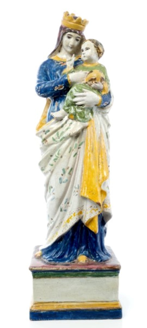 19th century Continental Majolica tin glazed pottery figure of Madonna and child, on square base,