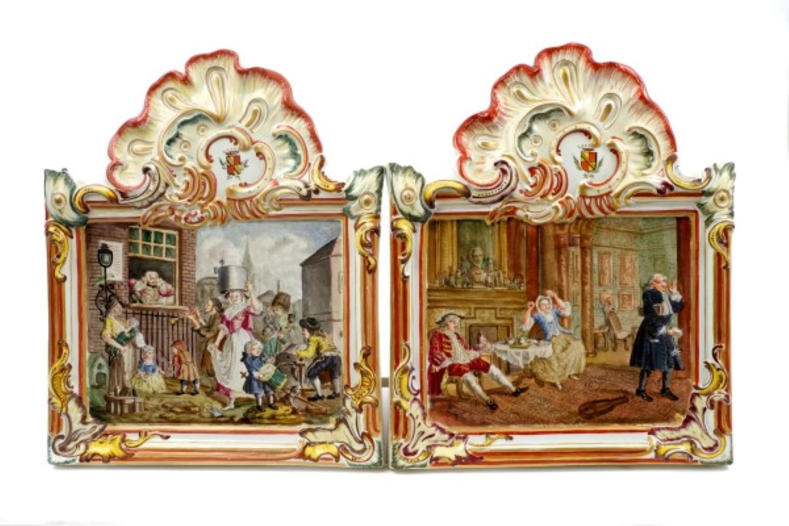 Pair of unusual late 19th century Continental pottery wall plaques with integral rococo moulded