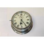 Early 20th century Smiths Astral ship bulkhead clock with white six inch dial with Roman numerals,
