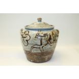 Large Wenford pottery jar and cover by one of the Cardews, with abstract frog decoration,