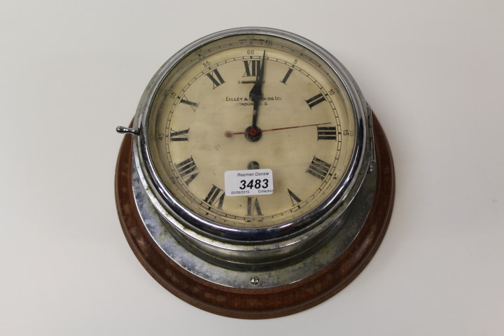 Early 20th century ships' bulkhead clock with eight day movement,