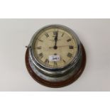 Early 20th century ships' bulkhead clock with eight day movement,