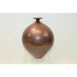 Studio pottery vase of ovoid form, with brown lustre glaze, incised on base - A. H., 24cm high