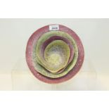 Studio pottery 'eggshell' bowl with alternating pink and green mottled layers, underside signed - M.