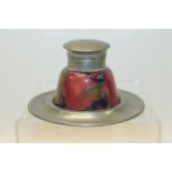 Moorcroft pottery inkwell decorated in the pomegranate pattern with pewter mounts and tray,