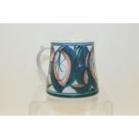 Studio pottery tankard of tapering form, with blue decoration on a white ground,