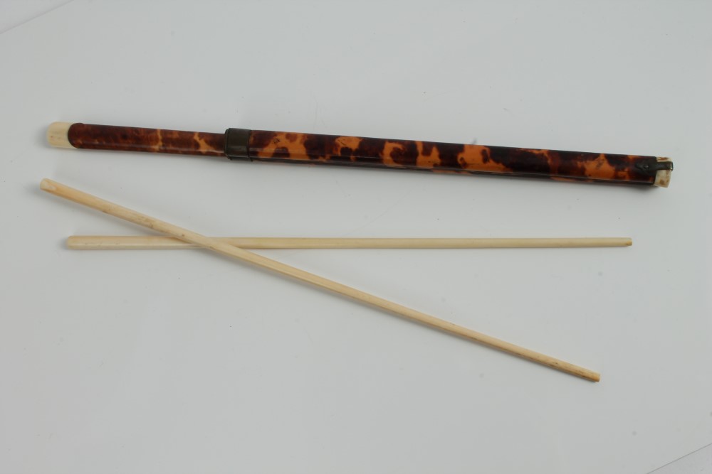 Pair of antique ivory chopsticks, housed within an ivory mounted tortoiseshell case,