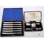 George V set of six fruit knives with silver handles, in a fitted case (Sheffield 1914),