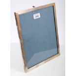 1930s silver mounted photograph frame of rectangular form, with oak easel back (Birmingham 1934),