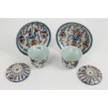Pair of 18th century Chinese Imari custard cups and covers and on stands of flared form on high