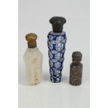 19th century Bohemian blue flash glass and white metal-capped scent bottle of tapering faceted form,