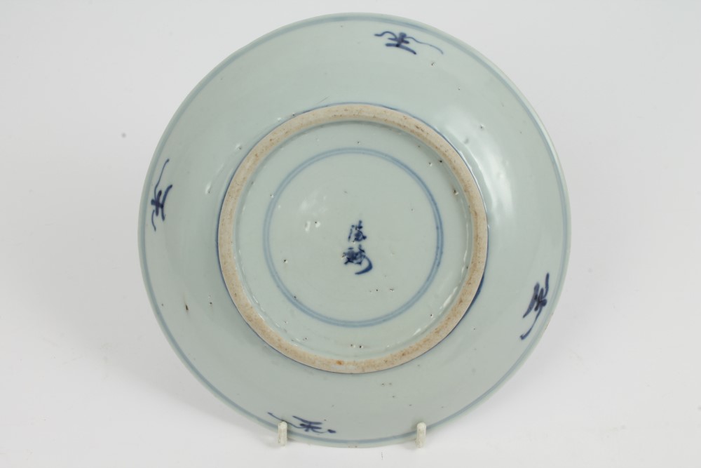 Chinese blue and white saucer dish decorated with a seated scholar in an interior six character - Image 3 of 4