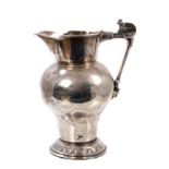 An interesting American sterling silver pitcher of inverted baluster form,