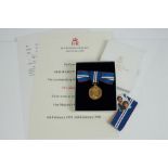 HM Queen Elizabeth II Golden Jubilee medal 2002 - unnamed as issued on bow ribbon in box,