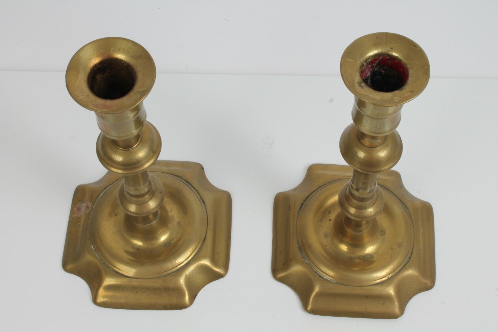 Pair of 18th century brass candlesticks, each with knopped column raised on canted square base, - Image 2 of 2