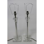 Pair of modern moulded glass Corinthian column table lamps each on shaped square bases,