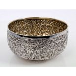 Indian silver bowl of circular form, with chased and engraved jungle scene decoration,