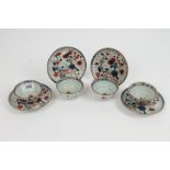Set of four 18th century Chinese Imari tea bowls and saucers, each decorated with moonflask