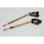 Two rare 19th century lace making carved ivory bobbins, the first inscribed and dated W Worsley,